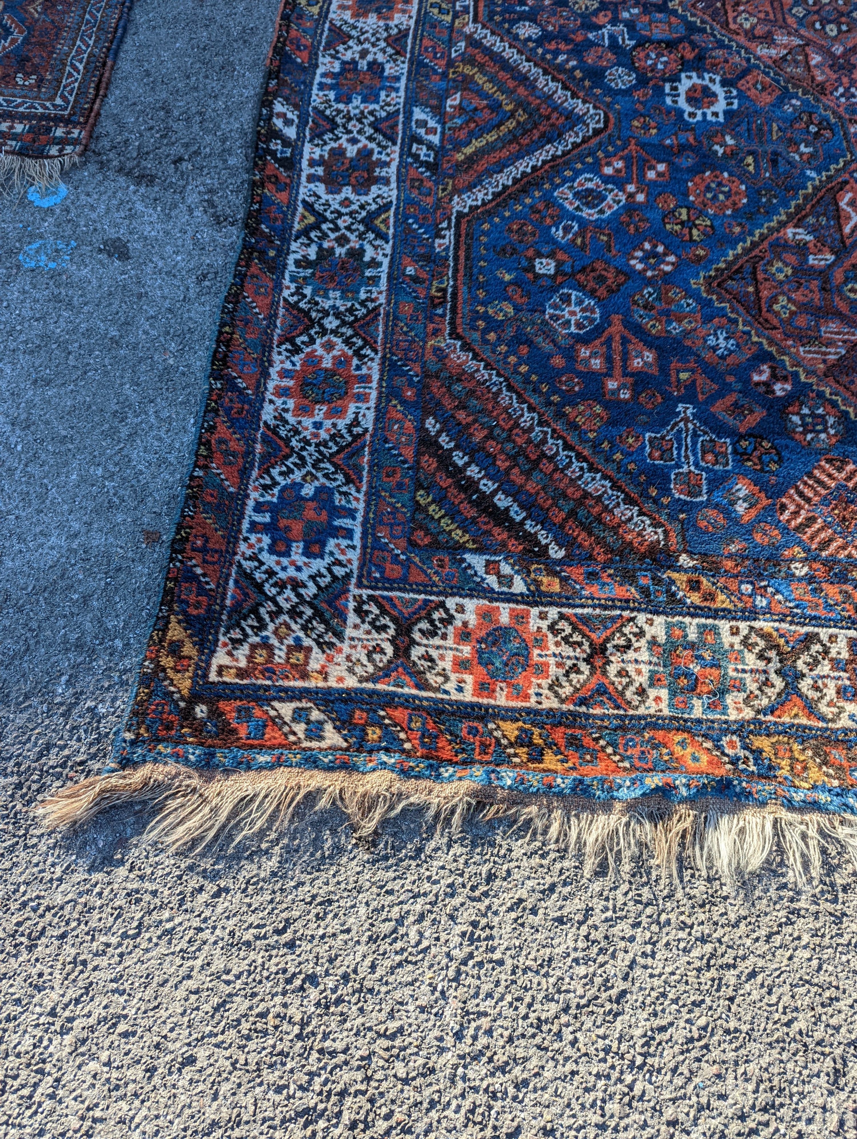 A Shirvan blue ground carpet, 315 x 222cm